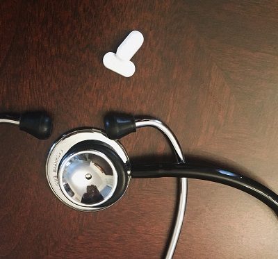 a stethoscope and some medication
